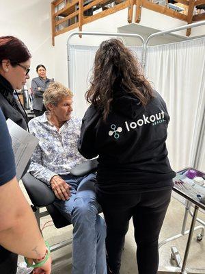 Blood draw in progress by Lookout Health phlebotomist