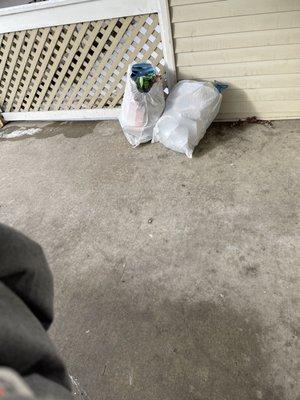 Trash in the front of the building