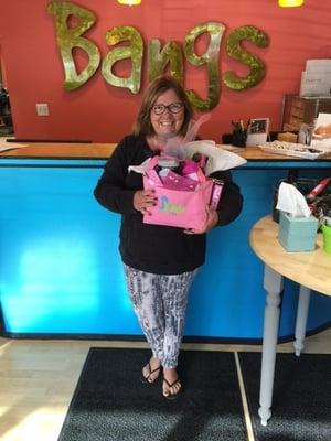 Our fall promotion winner with her goodies! Congratulations!