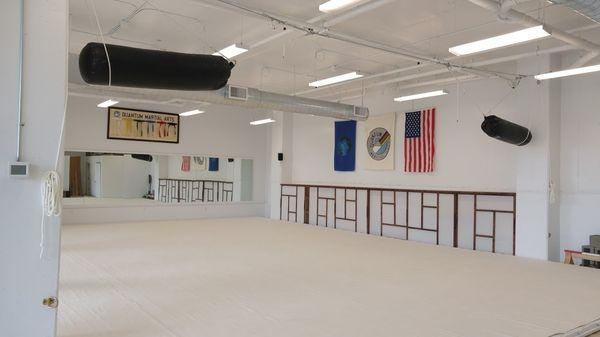 Suspended, padded training floor