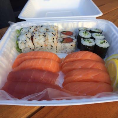 Salmon and tuna Nigiri and a spicy tuna and a cucumber roll