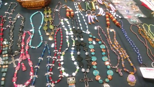 Various styles of beaded necklaces.