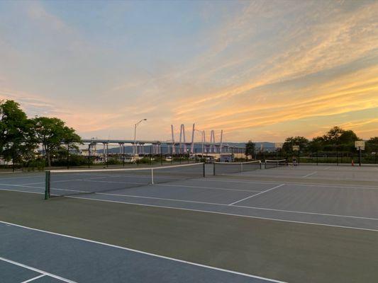 Cuomo bridge + tennis courts before sunset