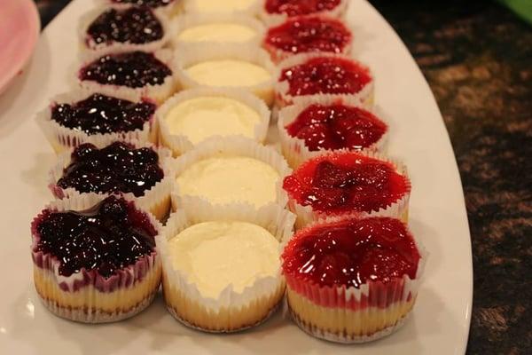 A tray of assorted mini cheesecakes will keep all your guests happy