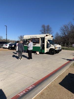 The beignet bus parked in the parking lot