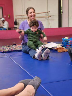 Miss Lindsay modeling an exercise with my son.