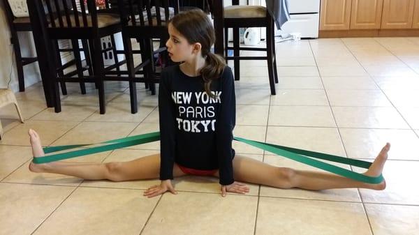 My daughter stretching at home so she can be the best dancer she can be!