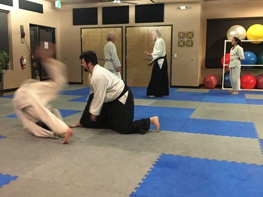 Students practicing kaiten nage