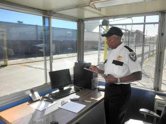 American Security Services security guard completing trucking and transportation security