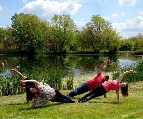 Celebrating Pilates Day doing "Side Plank" at the pond at Reiser Stables, Simpsonville, KY