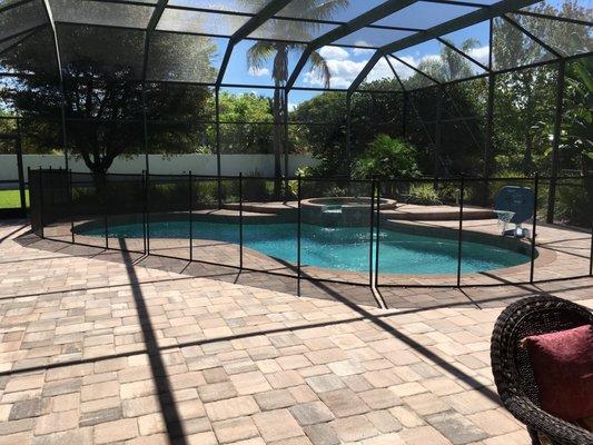 Pool Fence installed in paver deck.