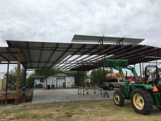 Installation of R panel roofing