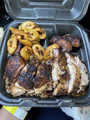 Jerk chicken over rice with a side of plantains