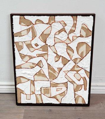 A textured abstract artwork on canvas. Stretched and framed with a dark walnut floater frame.