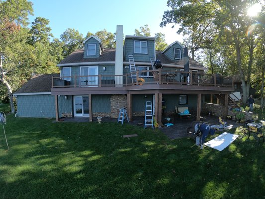 Siding job near completion with Cedar Shake.