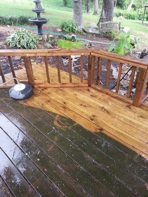 Cleaning a wooden deck: before and after.