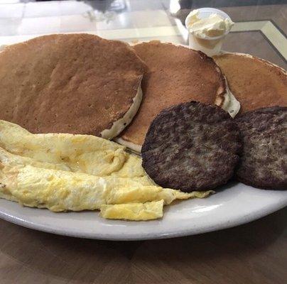 Pancakes Deluxe 
(Scrambled eggs and sausage patty)