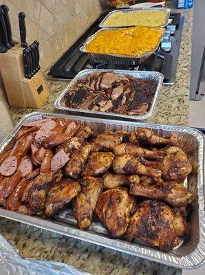 Sausage, brisket, chicken, smoked mac n cheese and potato salad