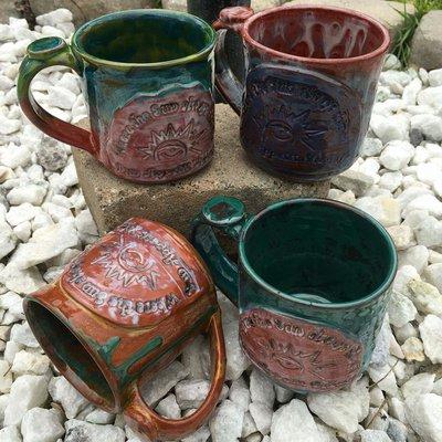 Our coffee mugs are all hand made by Down to Earth Pottery.