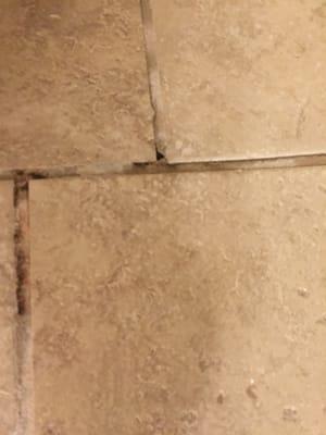 Grout coming out for the second time 27 months after move-in.