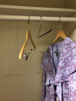 Two hangers and a slacks hanger.