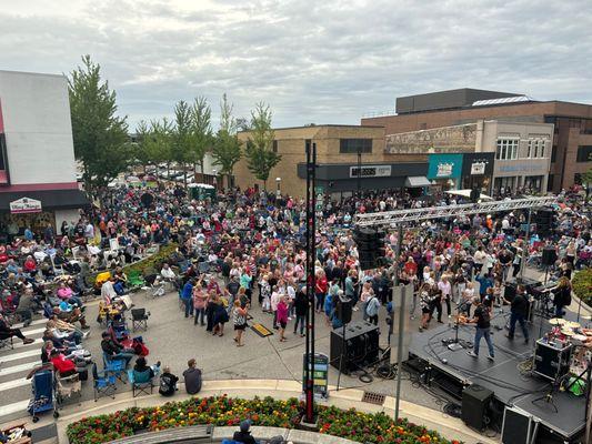 A summer night concert in The Commons Pedestrian Plaza