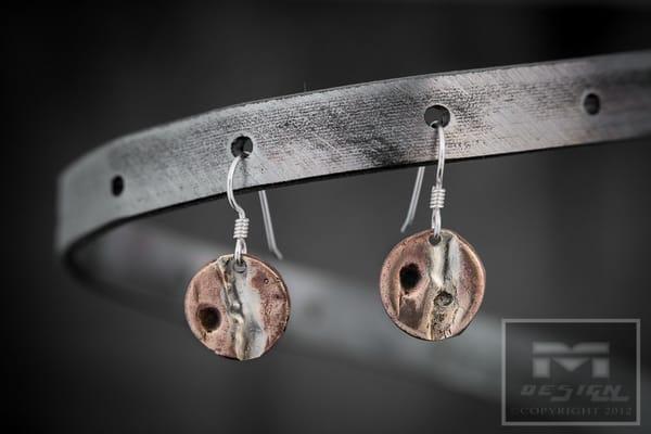 Copper and Silver earrings.