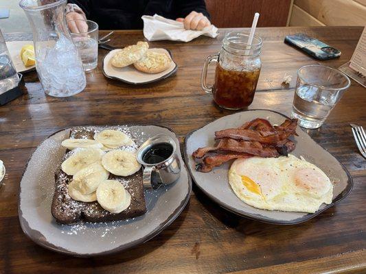 Banana French toast with bacon and eggs