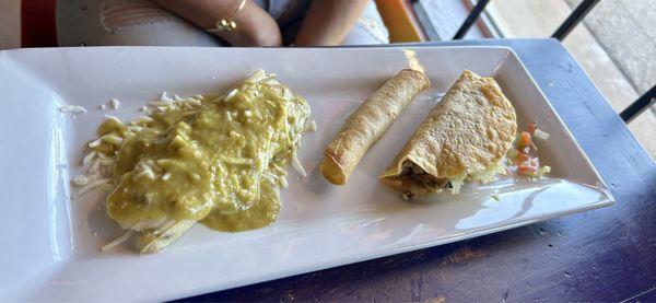 Smothered green Chile Tamal, chicken flauta en beef taco.  The taco was very delicious. Of note, none of the food served was greasy.