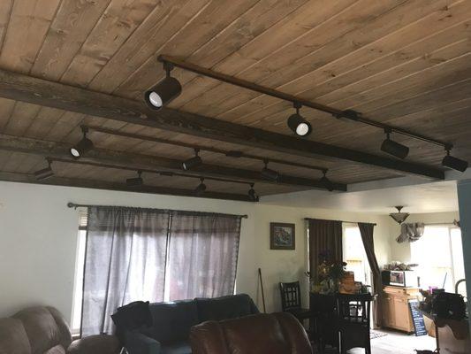 Lap boards on ceiling with beams