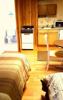 Each room is different. We have kitchenettes available also. Comes with dishes in each kitchen as well.