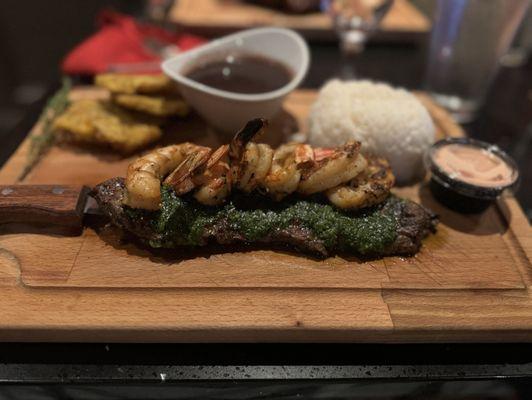 Churrasco w/shrimp, white rice, beans and Tostones