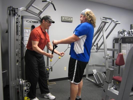 Nick, a former SDSU football players goes through a set of cable laterals.