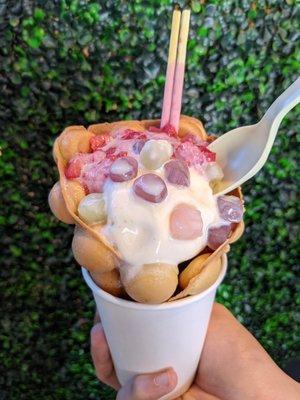 Bubble Waffle Cone (vanilla ice cream, mochi, strawberry, strawberry pocky, milk creme)