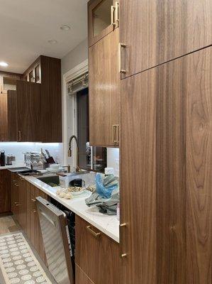 Walnut veneer frameless cabinet in Bellevue