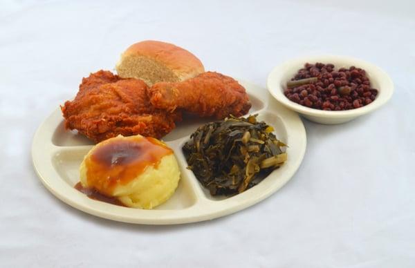 Fried Chicken, Mashed Potatoes, Collard Greens, Black Eyes Peas and a Roll