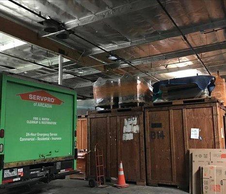 Inside the large crates is where we store your items during a pack-out.