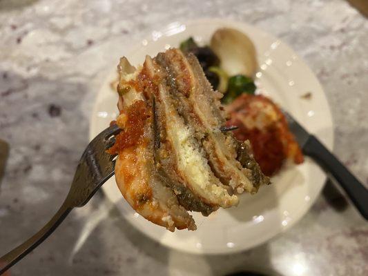 Close look at a nice layered bite of eggplant lasagna.