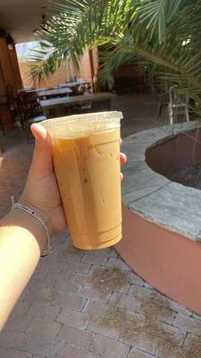 Iced caramel latte with macadamia nut milk