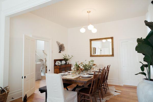 Our formal dining room in the parlor can comfortable fit a large family or group of friends for holidays, weddings and retreats.