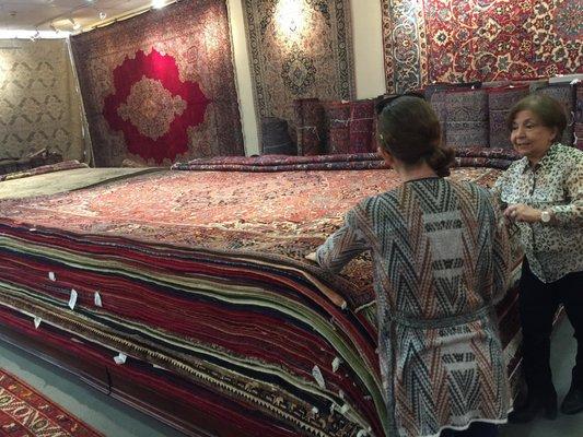 Mina guiding us through the complex world of rugs