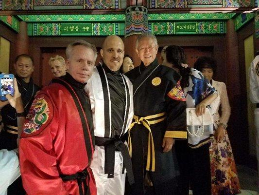 Masters Ceremony - (L) Chief Master Stauffer, (C) Master Church of Valdosta ATA, (R) Grand Master Emeritus Soon Ho Lee