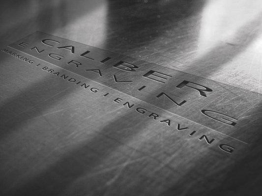 Logo etched in stone