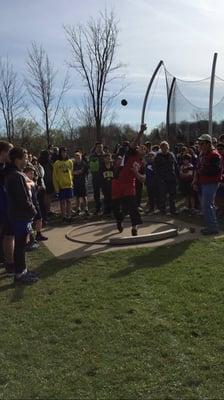 My youngest son Masan doing his first shot putt of the day.