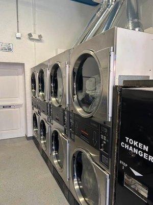 Dryers take quarters not tokens: .25 cents = 10min