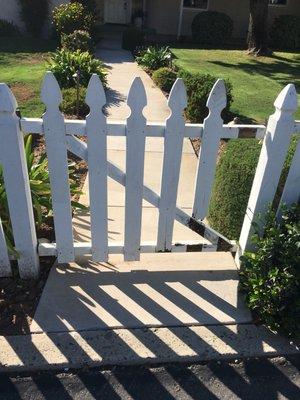 Fixing a rotted out wood gate.