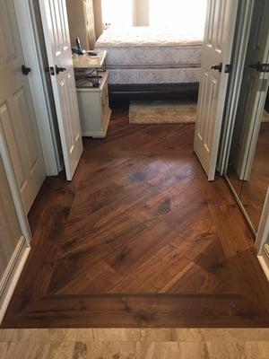 walnut hardwood with diagonal inlays and borders