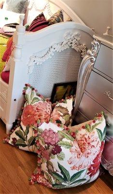 Fabulous Floral Print throw pillows with pom pom trim