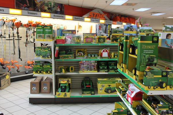 Ertl Toys and John Deere t-shirts, hats, and John Deere licensed merchandise in Moscow Mills showroom.