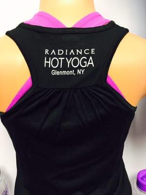 Nice assortment of Radiance Hot Yoga apparel including t-shirts and tank tops